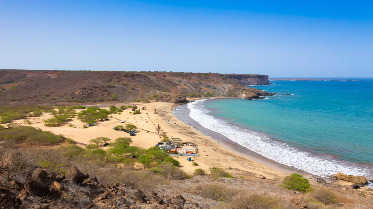 São Francisco Beach near Praia on Santiago Island, Cape Verde, a popular spot for windsurfing and water sports, with wide open waters and sandy shores.